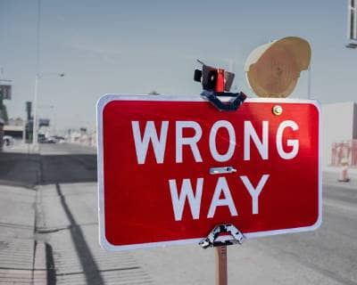 Road sign that says "Wrong Way"